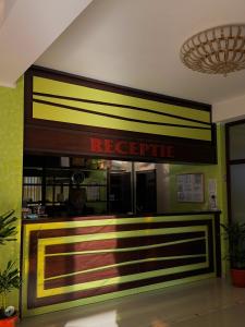 a restaurant with a sign that reads receipts at Hotel Ibiza in Eforie Nord