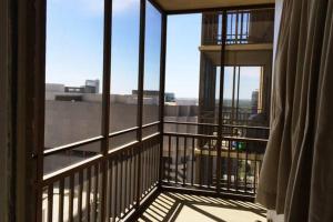 a balcony with a view of a city at Downtown 1 Bedroom Apt 20L in Atlanta