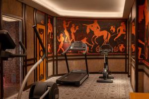 a gym with two exercise bikes in a room at Hôtel Le Magnifique Ex Hôtel Le M in Paris +39 photos