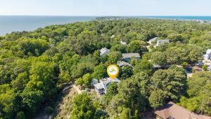 an aerial view of a house on a hill with a sign at 3021 - Southern Snores in Kitty Hawk Beach +65 photos