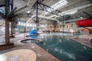 a large swimming pool in a large building at Townhome 4BR/4BA in Silverthorne in Silverthorne
