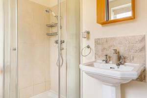 a bathroom with a sink and a shower at 3 Bed in Hawes oc-ds967 in Hawes +16 photos