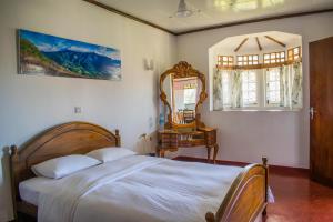 Postel nebo postele na pokoji v ubytování Mount Mary Inn