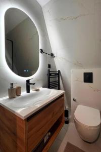 a bathroom with a sink and a mirror at View Retreat in Visoko