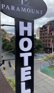 a large sign for a restaurant in a parking lot at Paramount Hotel in Bogotá
