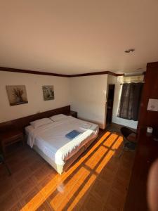 a bedroom with a white bed in a room at Vibes Solution in Patong Beach +17 photos