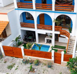 an aerial view of a building with a swimming pool at Villa PalMarina in Praia