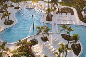 an overhead view of a swimming pool at a resort at Golf Coast Bleu Studio - 3160 in Zephyrhills