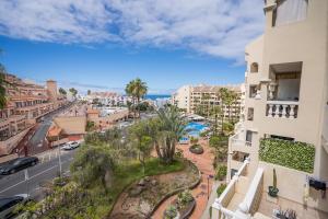 a view of a street in a city with buildings at Noemi Blu Tenerife in Los Cristianos