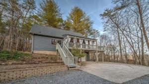 a home with a staircase leading to a house at Love Affair in Epworth