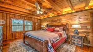 a bedroom with a bed and a ceiling fan at Falling Waters in Blue Ridge