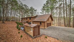 a small cabin in the middle of a forest at Falling Waters in Blue Ridge