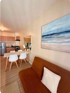 a living room with a couch and a table at Avida Towers Riala Tower 1 in Cebu City