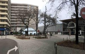 an empty street in a city with a building at Studio BRITTANY in Chambéry