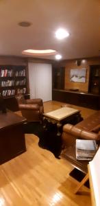 a living room with a couch and a table at Holiday Home in Gevgelija