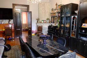 a dining room with a table and chairs at Tsikhisdziri House 3 in Ts'ikhisdziri