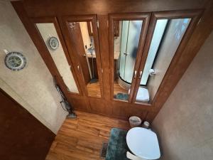 an overhead view of a bathroom with a toilet at Florida VIBE in Homosassa Springs +11 photos