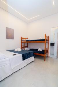 a bedroom with two bunk beds at Airport Hotel Gru in Guarulhos +40 photos