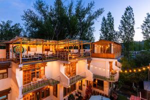 an aerial view of a house with lights at Rainbow Hostelier in Leh