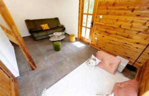 an overhead view of a living room with a couch at Tara Rafting Resort in Foča