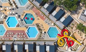 an overhead view of the pool at a resort at Aminess Style Camping Atea Glamping & Holiday Homes in Njivice +100 photos