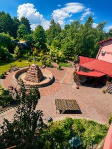 an overhead view of a park with a bench and a fountain at Glory Apart Hotel in Truskavets