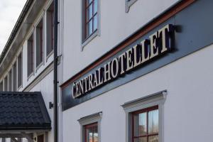 a sign on the side of a building at Central Hotellet Tierp in Tierp