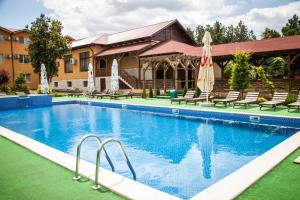 Bazén v ubytování Hotel Mondial - Baia nebo v jeho okolí
