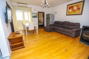 a living room with a couch and a table at Medo in Novigrad Istria
