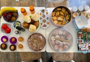 a table with many different types of food on it at B&B da Miranna in Dorgali