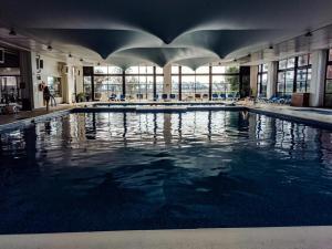 a large swimming pool in a large building at Spa vacacional in Mar del Plata