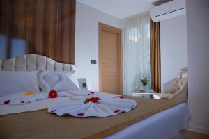 Katil atau katil-katil dalam bilik di Safran City Hotel&SPA