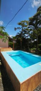 a large blue swimming pool in a yard at Romantic Suite with Pool in Fortuna
