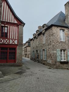 an empty street in an old stone building at Maison le 28 in Jugon Les Lacs
