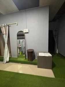 a model of a bathroom with a bird cage at RADHE RADHE HOMESTAy in Dithur