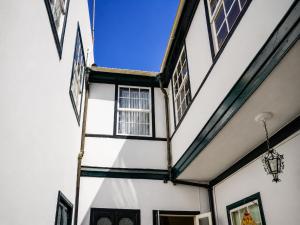 a view of the front of a building at Casa Los Profesores, encanto tradicional canario en La Orotava in La Orotava +38 photos
