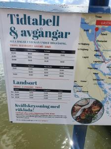 a ticket for a trip to india and a map at Femöre marin in Oxelösund