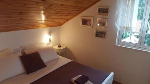 Postel nebo postele na pokoji v ubytování Apartments Bianki