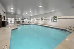 a large swimming pool in a building at Best Western Plus Spokane North in Spokane