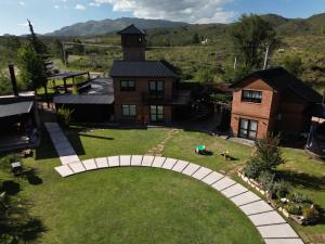 an aerial view of a house with a yard at Aguamansa Apart in Potrero de los Funes