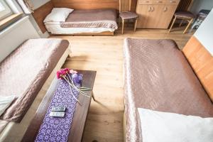 Posteľ alebo postele v izbe v ubytovaní Guest House Wanda