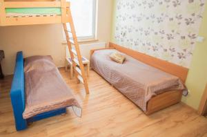 Posteľ alebo postele v izbe v ubytovaní Guest House Wanda