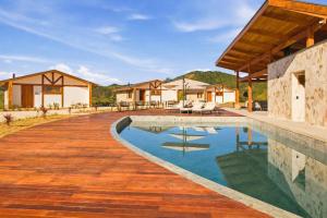 an image of a house with a swimming pool at Casa ALPIN in São José dos Campos