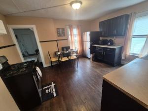 an aerial view of a kitchen with a stove top oven at Humble beginning 605 EM in Norwich