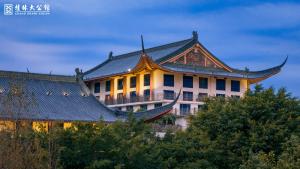 a building with a chinese roof at Grand Bravo Guilin in Guilin