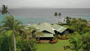 an aerial view of a house by the ocean at Ucuilagi Resort in Matei