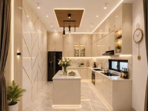 a large kitchen with white cabinets and a counter at Hoàng Vũ VILLA in Nhâm Lăng