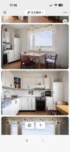 a kitchen with white cabinets and a dining room at Paradise in Lidingö