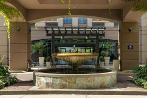 a fountain in the middle of a building at DoubleTree by Hilton North Vancouver in North Vancouver