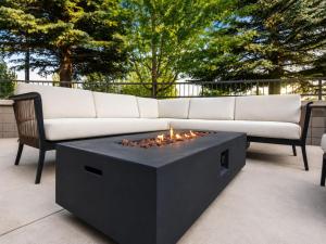 a couch and a fire pit on a patio at Hampton Inn By Hilton Hailey Sun Valley in Hailey